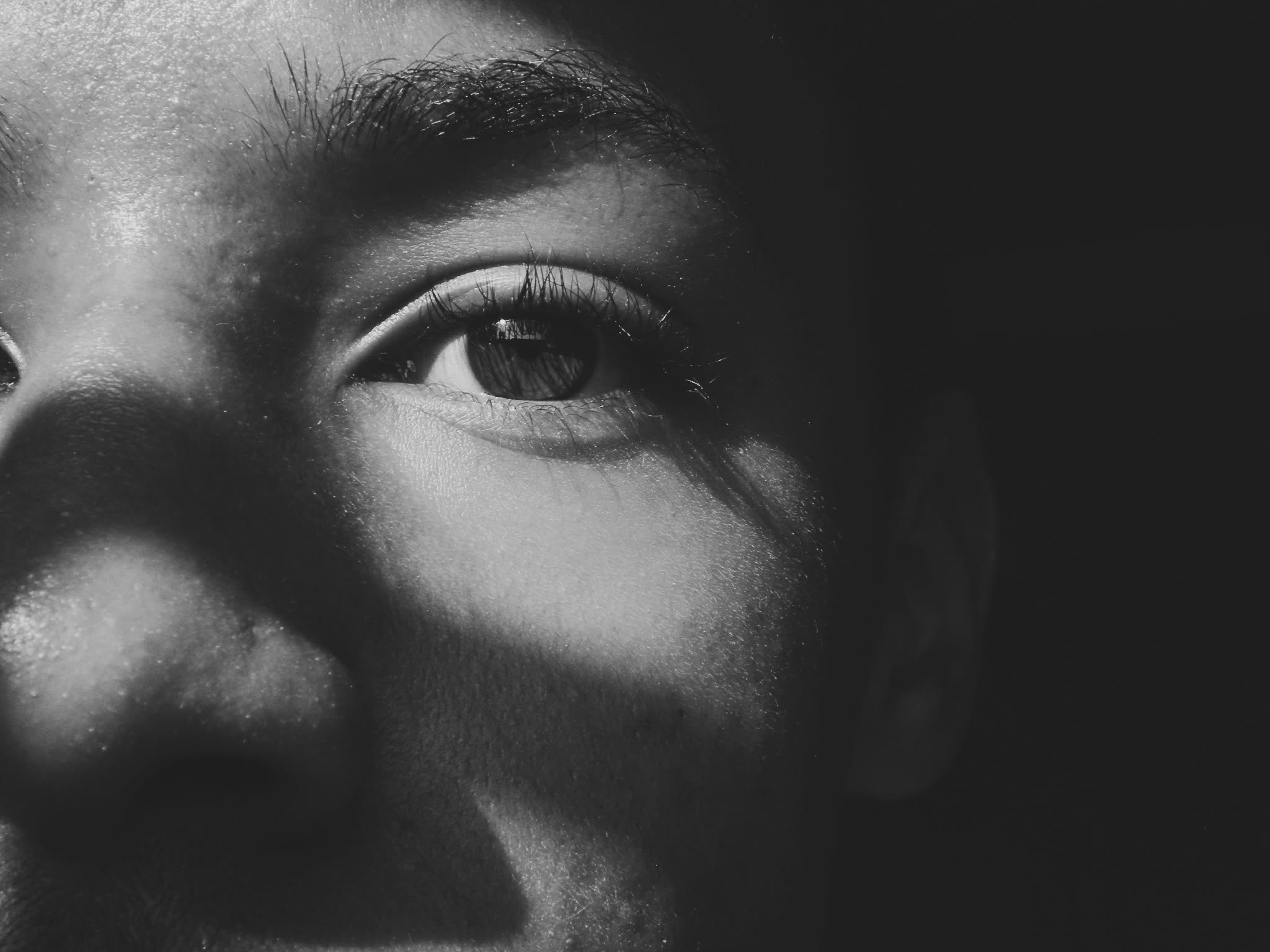 Black and white portrait, close-up of a face